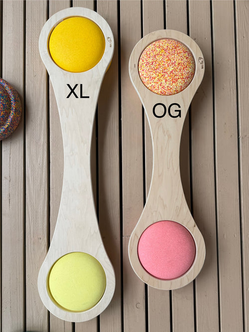 Handmade maple wood balance board for kids, flat view on wood deck