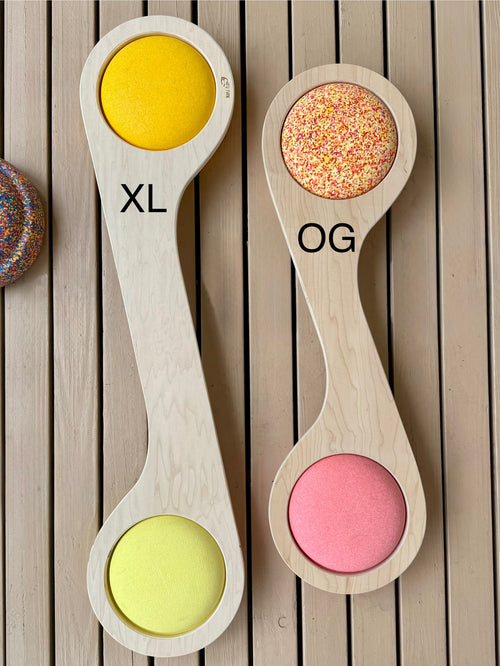 Handmade maple wood balance board for kids, flat view on wood deck