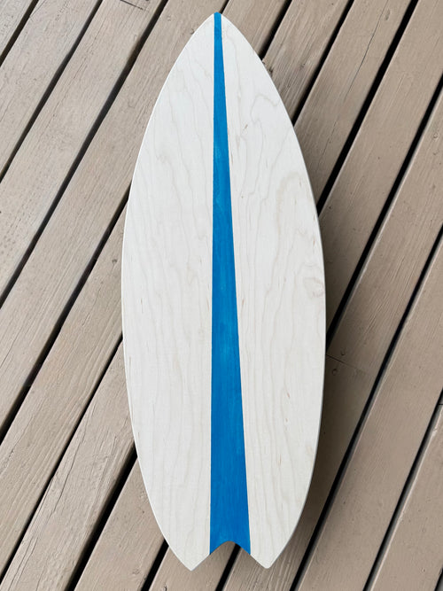 Wooden surfboard with a blue stripe on a wooden deck