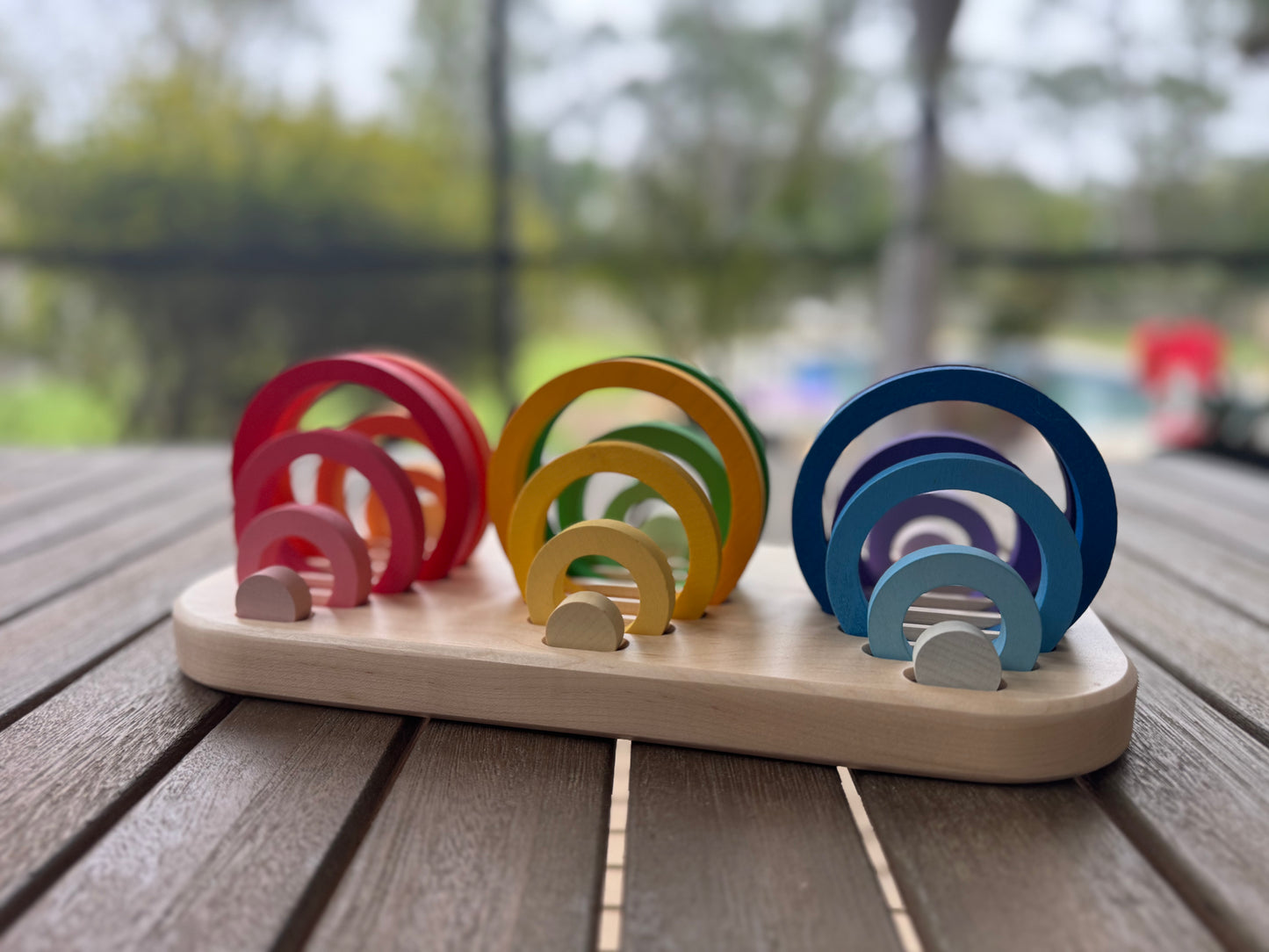 Handmade wooden tray designed for organizing nesting rings