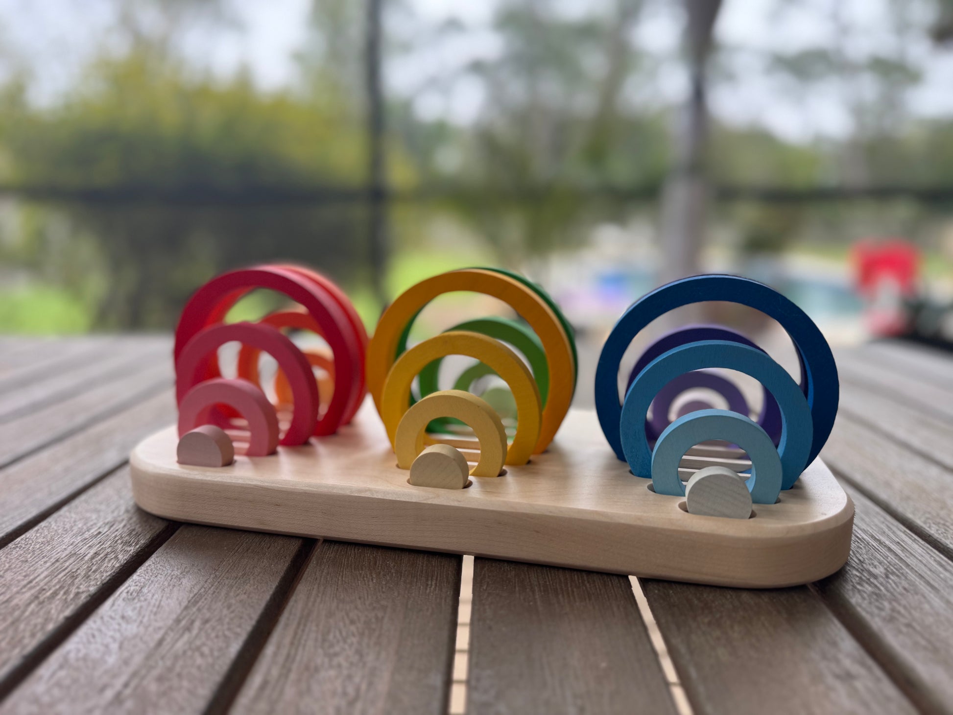 Handmade wooden tray designed for organizing nesting rings